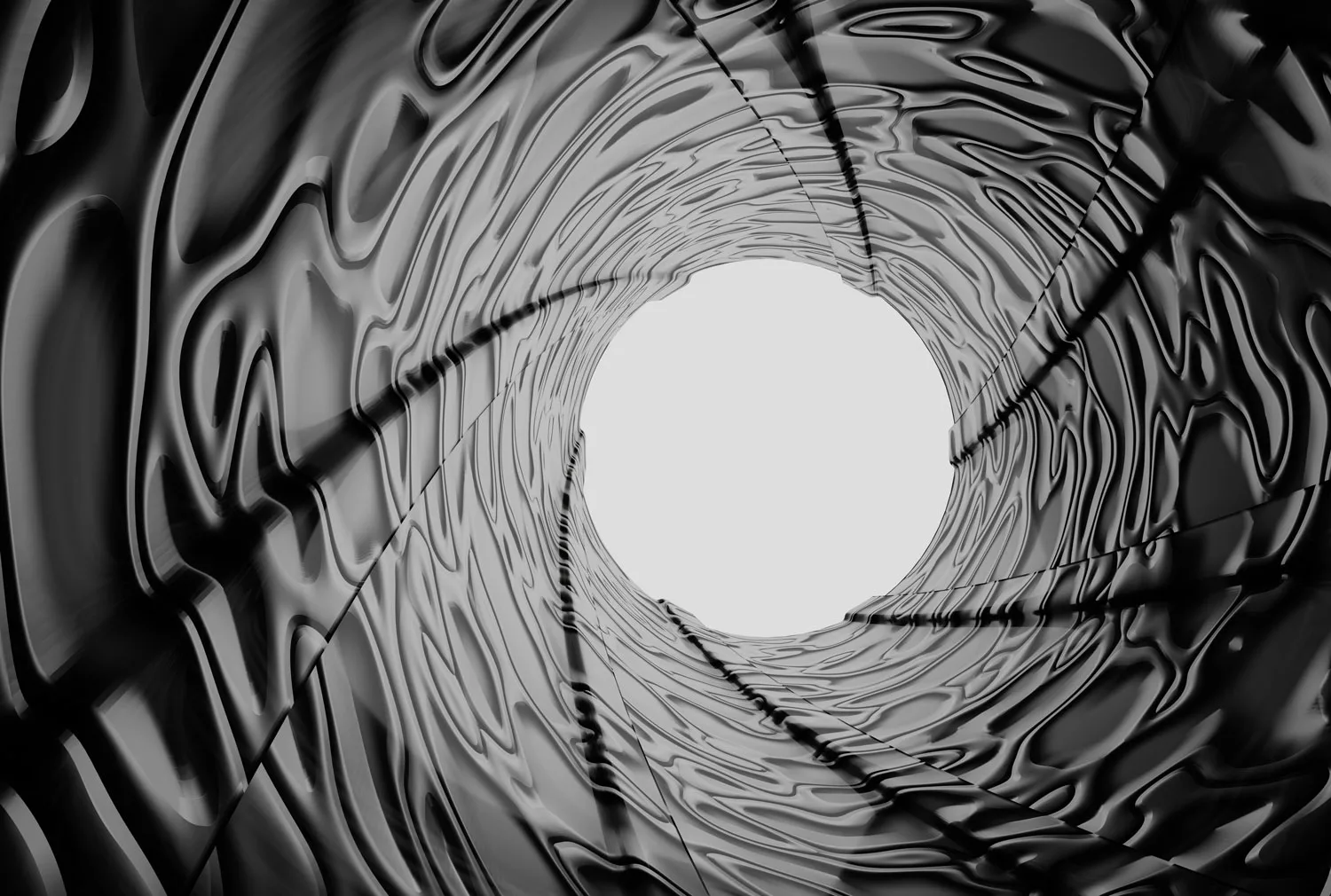 Black and white abstract of a rippled metallic surface around a circular light source