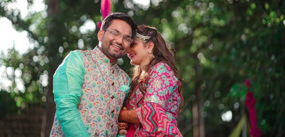 Bride and groom close together outdoors in traditional dress, candid wedding photography Bangalore